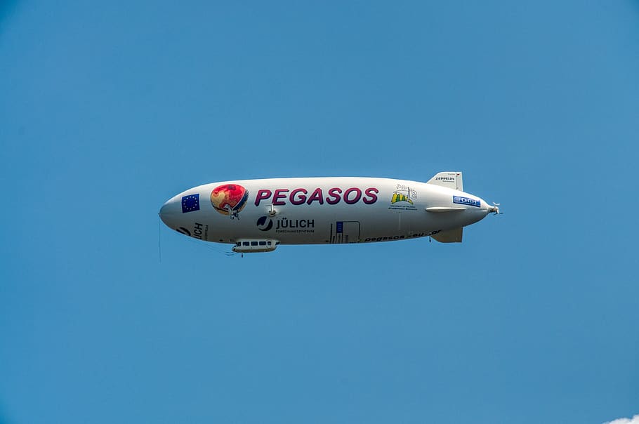 zeppelin, rigid airship, flying, aircraft, air vehicle, airplane, transportation, blue, mode of transportation, clear sky