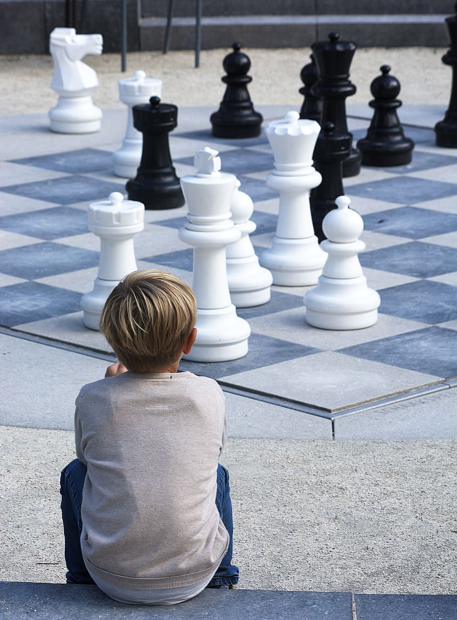 boy, chess, black, kid, outside, watching, game, chessboard, white, king