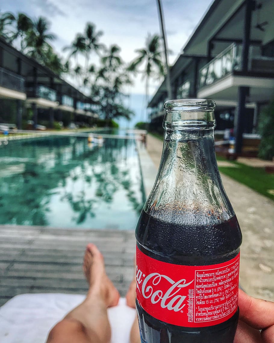 cola, hotel, tourism, swimming pool, coca-cola, soda, human body part, human hand, real people, one person