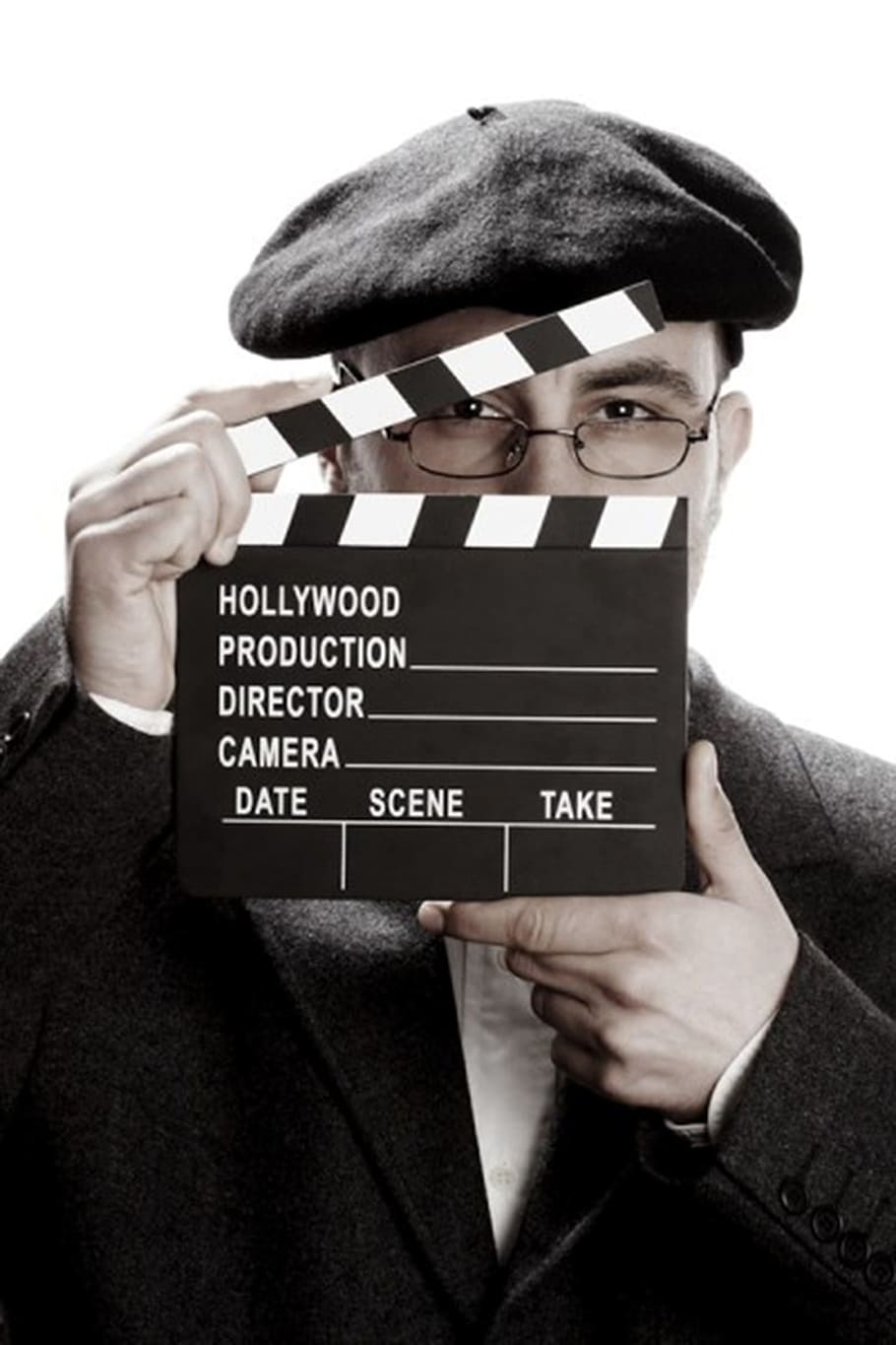 person, holding, white, black, clapper board, Hat, Director, seen, one man only, human hand