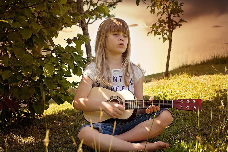 girl, playing, ukulele, grass field, person, human, child, guitar, music, nature
