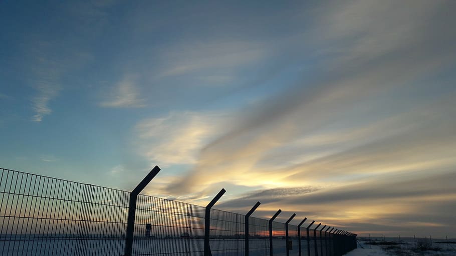 black metal fence, silhouette, black, barrier, golden, hour, sea, ocean, blue, water