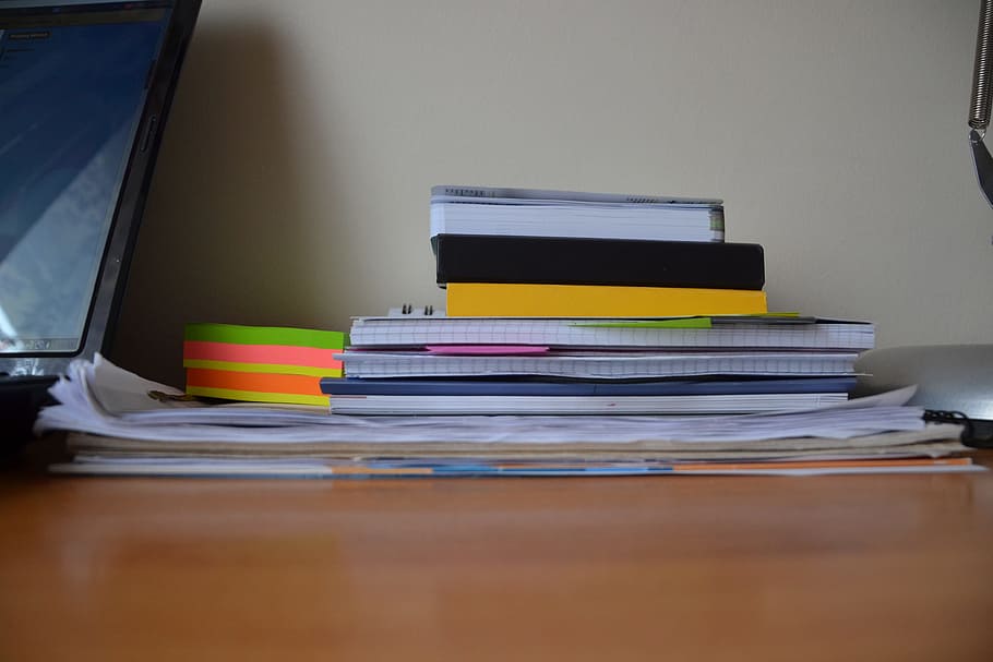 assorted-color book lot, papers, books, notebooks, pads, supplies, desk, desktop, office, school
