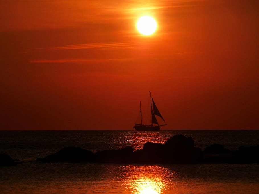 silhouette photo, sailboat, body, water, golden, hour, sea, sunset, ocean, red