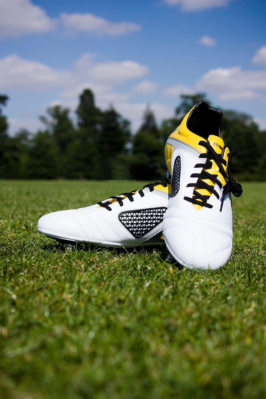 pair, white-and-yellow cleats, green, grass, Football, Boots, Shoes, Sport, Field, football, boots