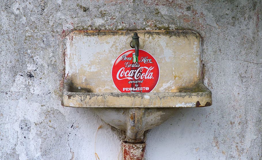 coca-cola sink, coca cola, bathroom sink, old, stainless, red, text, communication, wall - building feature, sign