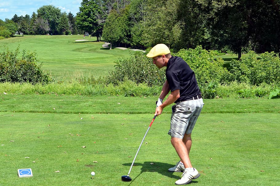 golfer, golfing, golf swing, lefty, left handed, man, golf ball, tee, teeing ground, golf glove