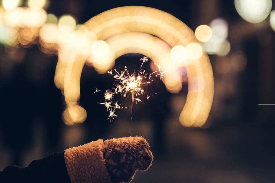 bokeh photography, person, holding, sparkler, city, architecture, adult, bokeh, celebrations, christmas