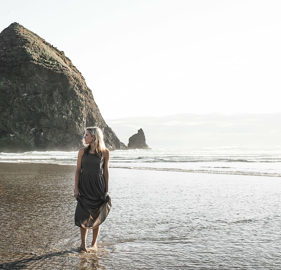 woman, gray, dress, standing, beach, brown, sleeveless, near, ocean, sky