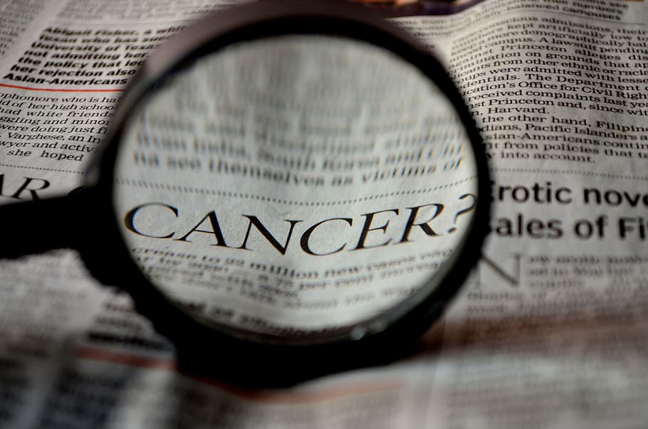 newspaper article, magnifying, glass, viewing, word, cancer, close up, printing, newspaper, magnifier