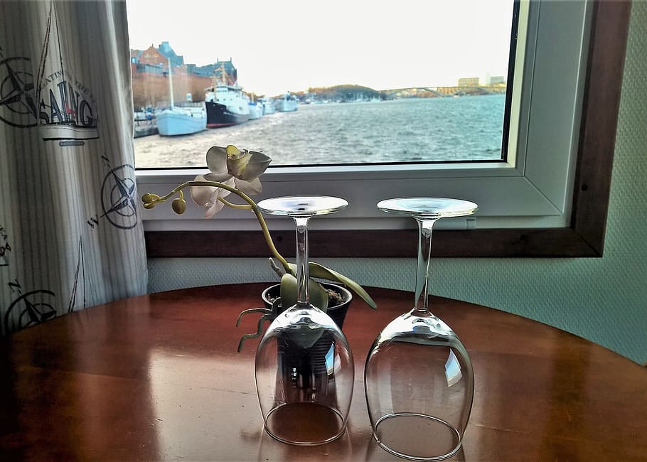 two, clear, wine glasses, table, on the ship, inside, under the roof, room, window, for two