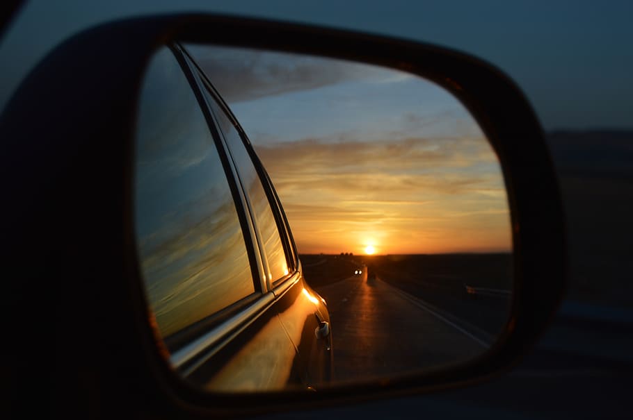 vehicle side mirror, showing, following, road, sunset, rear view mirror, perspective, past, car, rear