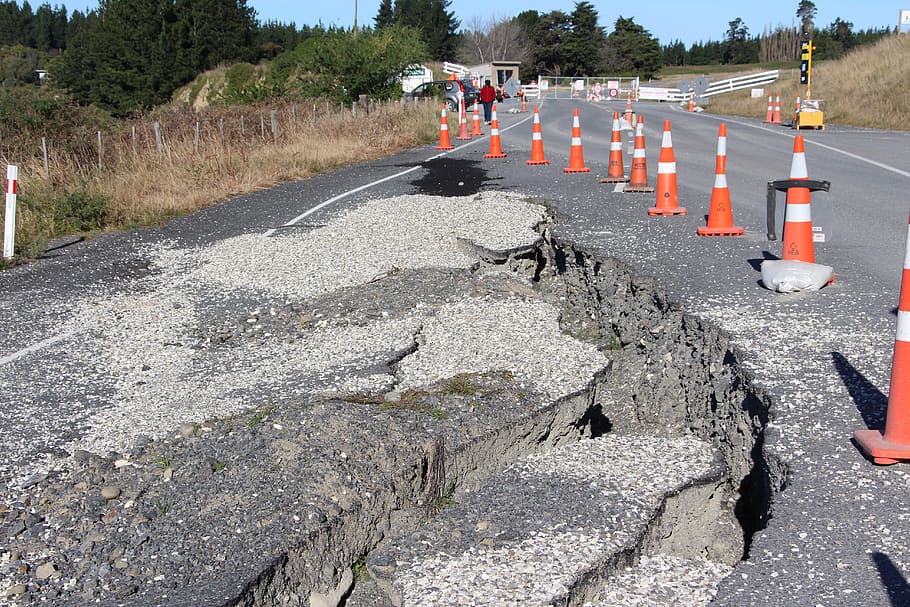road, broken, crack, earthquake, damage, cones, repairs, roadwork, group of people, transportation