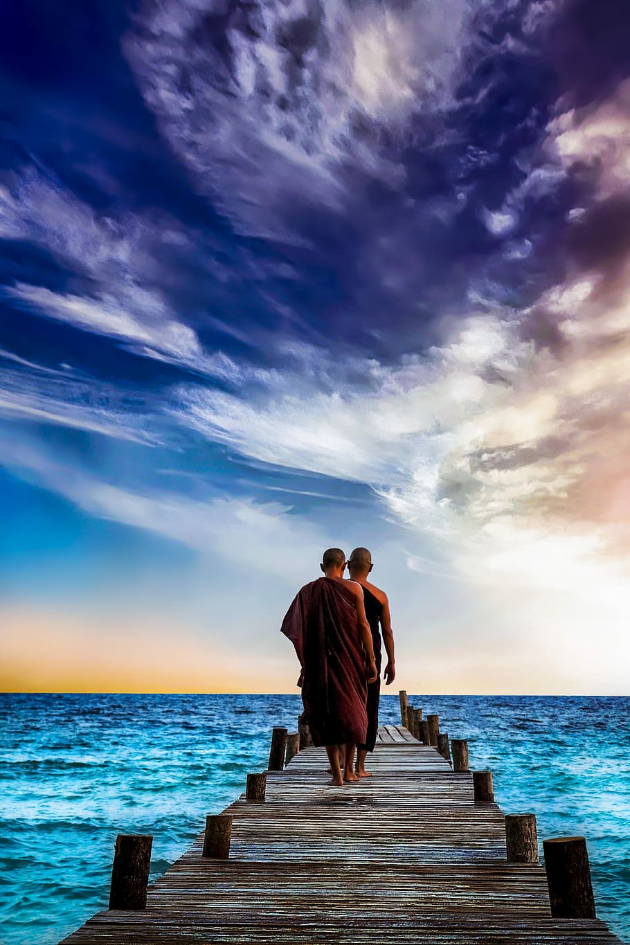 two, monks, walking, wooden, dock, water, sunset, sea, sky, ocean