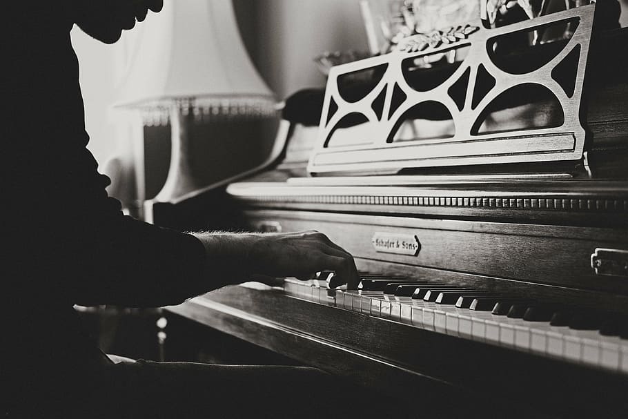 grayscale photography, person, playing, console, piano, classical, organ, wood, old, vintage