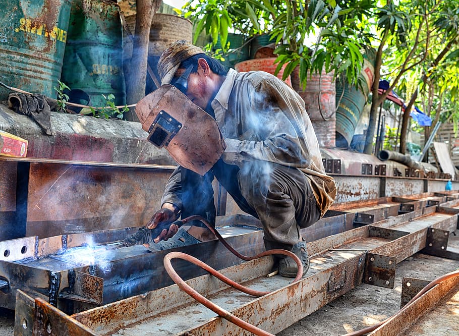 man, holding, welding mask, container drums, craft, dirty, heat, industry, iron, manual labor
