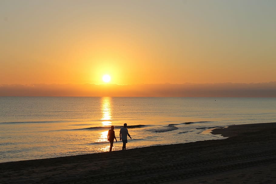 two, persons, walking, beach, golden, hour, dawn, sun, the sunset, orange sky