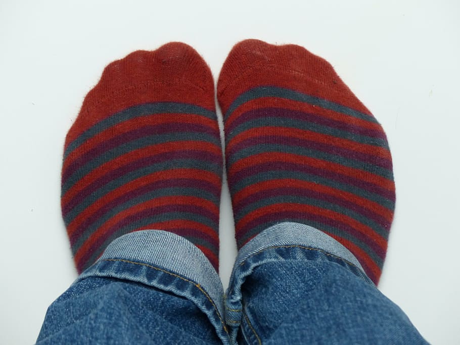 person, showing, pair, red-and-blue, striped, socks, stockings, red, ringed, pants
