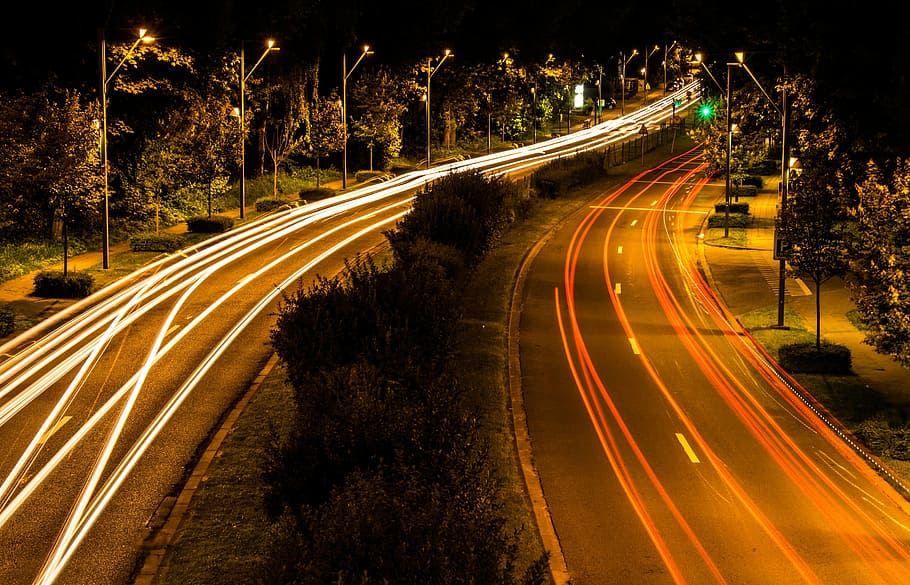 timelapse photography, passing, cars, two, highways, center isle, nighttime, two highways, center, isle