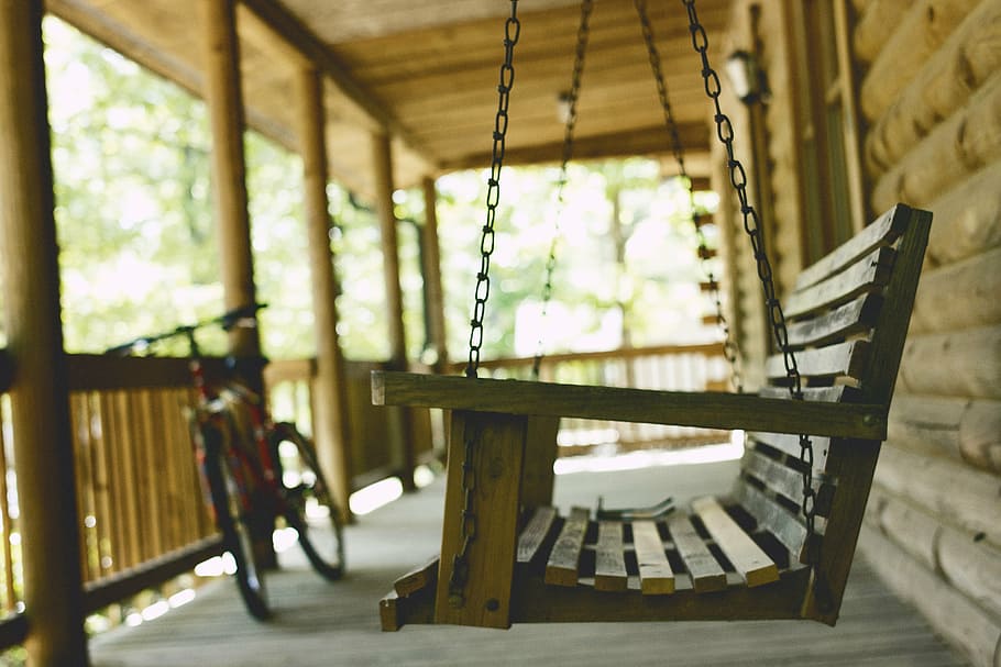 shallow, focus photography, brown, wooden, swing bench, bench, bicycle, bike, chair, depth of field