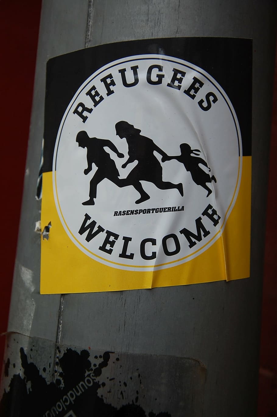 refugees, welcome, sticker, sign, communication, representation, human representation, close-up, text, black color