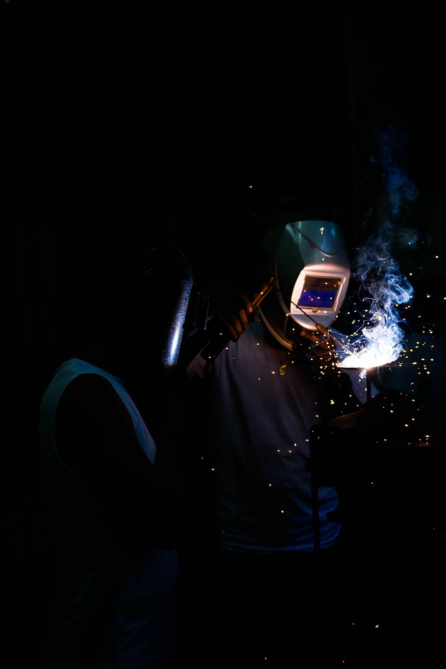 person, wearing, gray, holding, welding machine, welder, welding, men, manual Worker, night