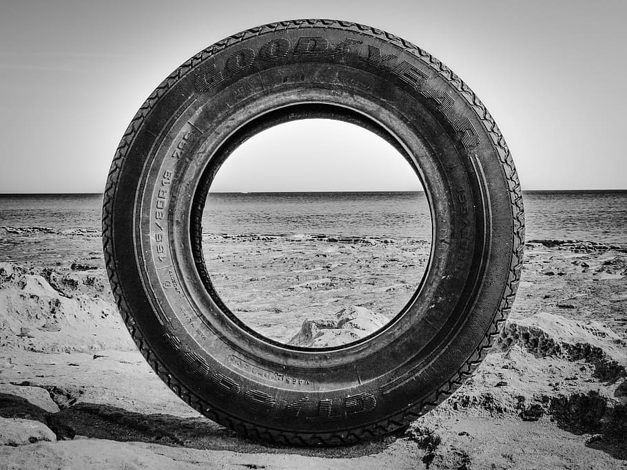 tire, discarded, rubber, waste, used, garbage, recycling, goodyear, sky, land