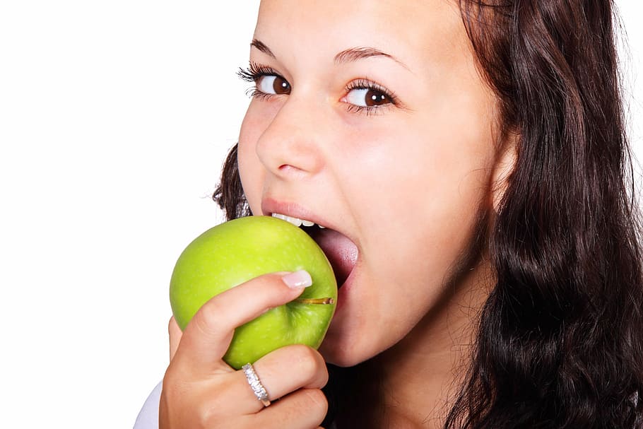 woman, silver-colored ring, holding, green, apple, bite, diet, eat, face, female