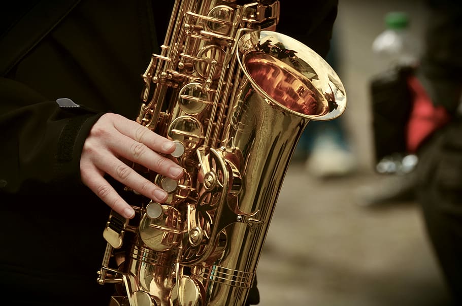 person playing saxophone, saxophone, musical instrument, music, instrument, jazz, musician, brass, brass instrument, wind instrument