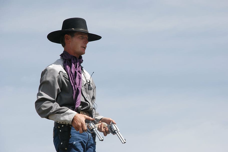 man, holding, two, gray, revolvers, cowboy, guns, western, revolver, pistol