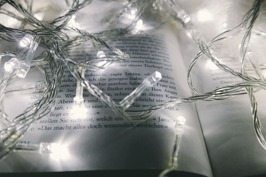 photography, turned, white, string lights, opened, book page, abstract, art, blur, book