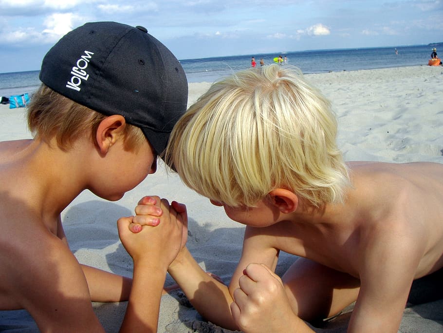 two, boys, playing, beach, arm wrestling, strong, children, blond, cap, men