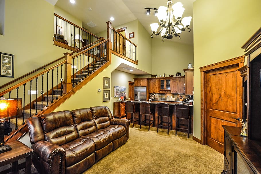 brown, leather, reclining, sofa, staircase, room, interior, home, real estate, kitchen