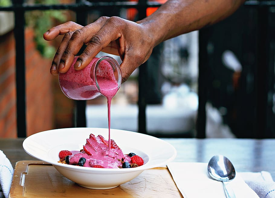 person, pouring, strawberry syrup, mixed, berry fruit, people, hands, yoghurt, dessert, pink