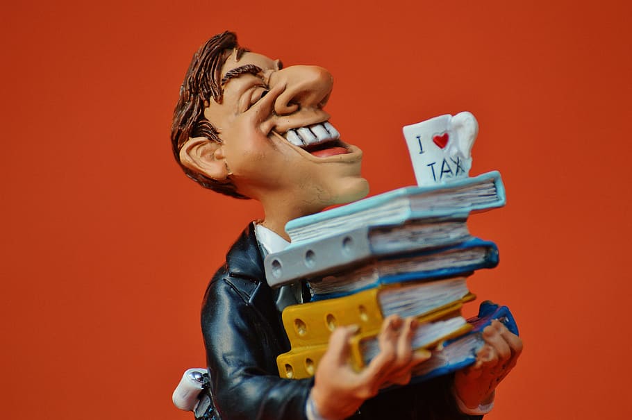 laughing, man, holding, books figurine, tax consultant, office, files, funny, bureaucracy, figure