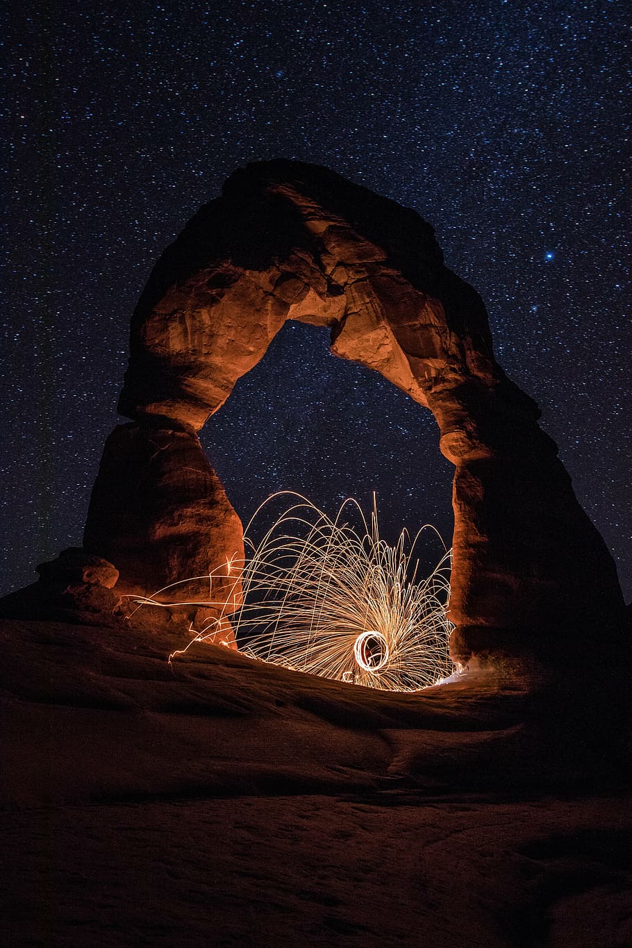 steel wool photography, rock formation, night, time, lapse, photography, red, light, starry, arch