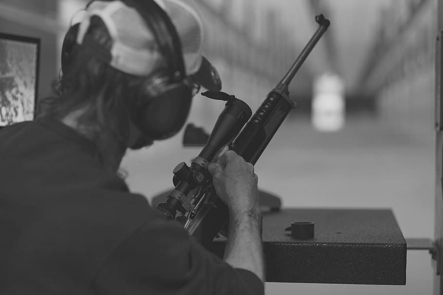 grayscaled photo, man, holding, rifle, shooting range, scope, sniper, target, gun, bullet