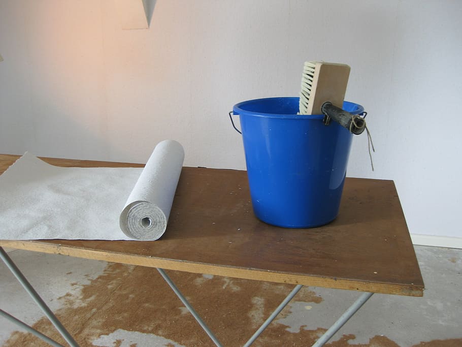 brown, brush, blue, plastic bucket, placed, top, table, wallpaper, paste, bucket