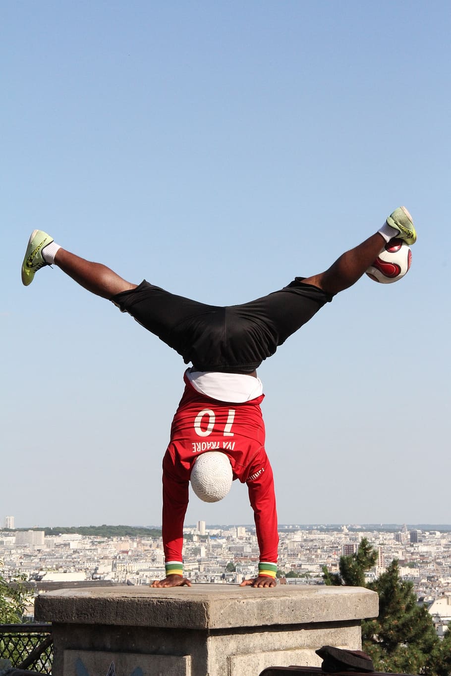 busker, soccer, street performer, paris france, sky, one person, clear sky, full length, lifestyles, copy space
