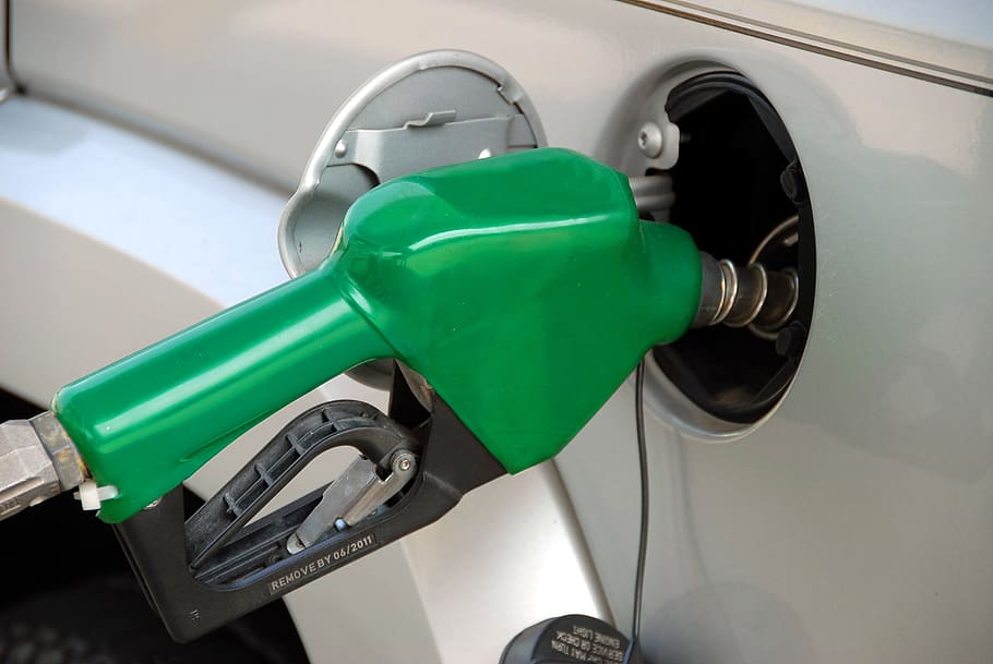 green, fuel, pump, nozzle, plugged, vehicle fuel tank, Pumping Gas, Fuel, Pump, Industry, gas