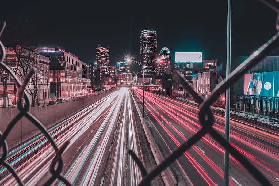 time-lapsed photo, vehicle, passing, road, nighttime, wire, fence, view, street, city
