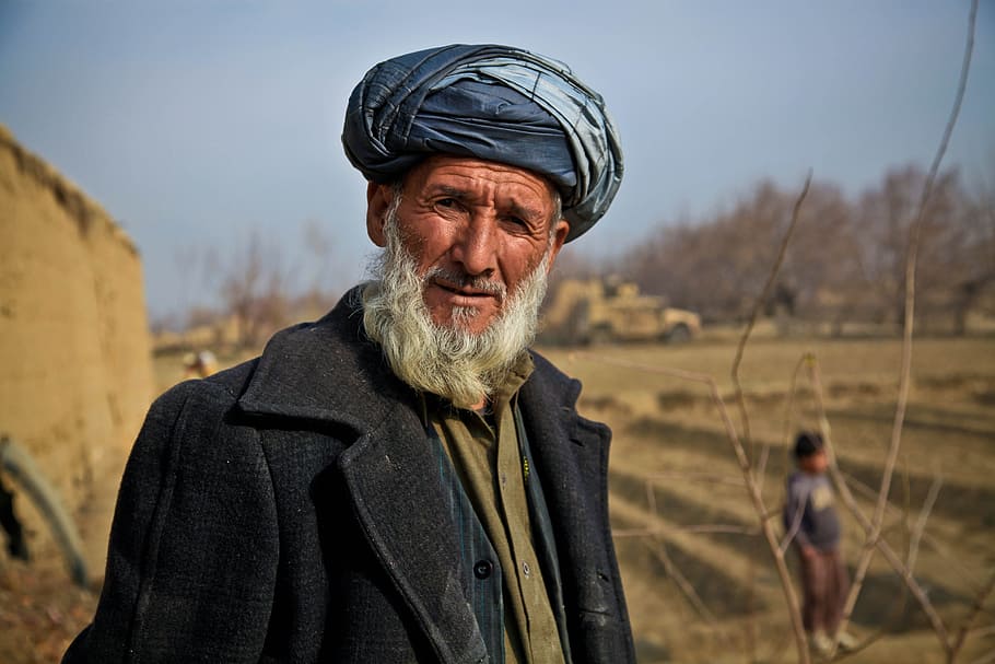 shallow, focus photography, man, wearing, black, trench coat, daytime, old, afghanistan, person