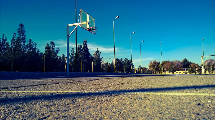blacktop basketball court, basketball, court, sport, landscape, tree, plant, road, transportation, sky