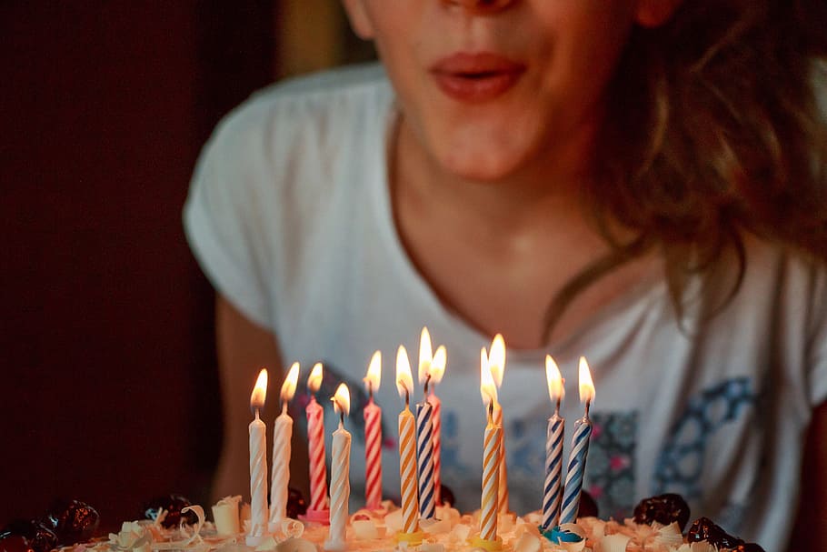 woman, wearin, ggray, printed, shirt, blowing, candle, cake, birthday, candles