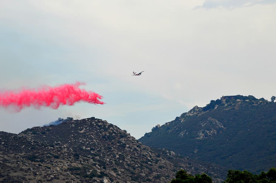 wildfire, aerial firefighter, firefighters, boray bomber, aerial bomber, fire retardant, smoke, hills, mountains, red