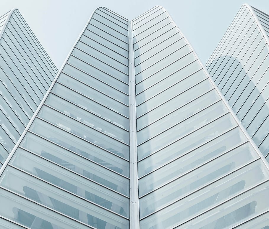 low-angle photo, gray, concrete, frame glass buildig, architecture, white, building, infrastructure, skyscraper, tower