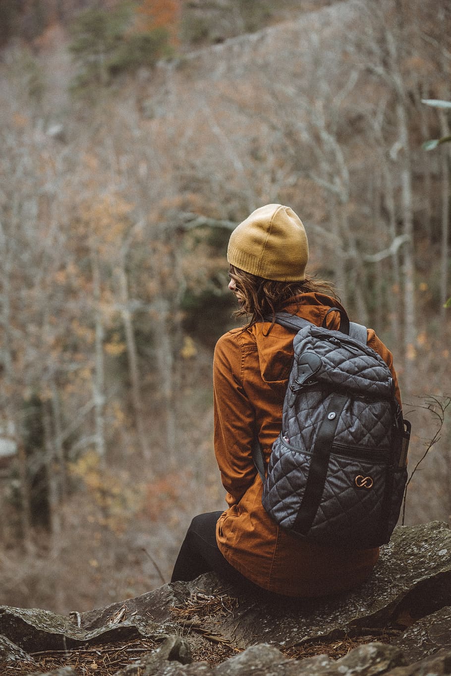 backpack, people, sitting, woman, beanie, trees, plant, forest, blur, real people