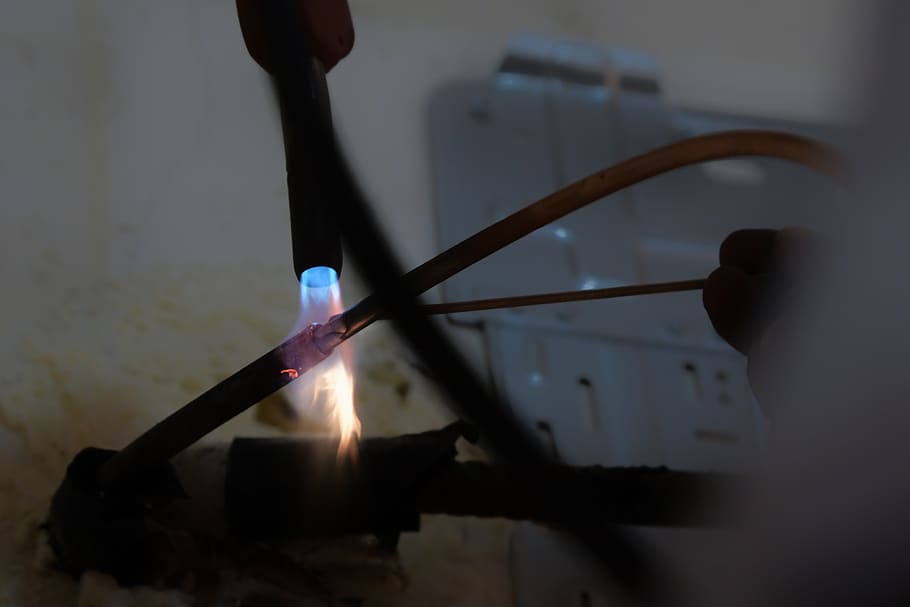 ac repair, copper welding, indoor unit, burning, fire, flame, fire - natural phenomenon, human hand, nature, hand
