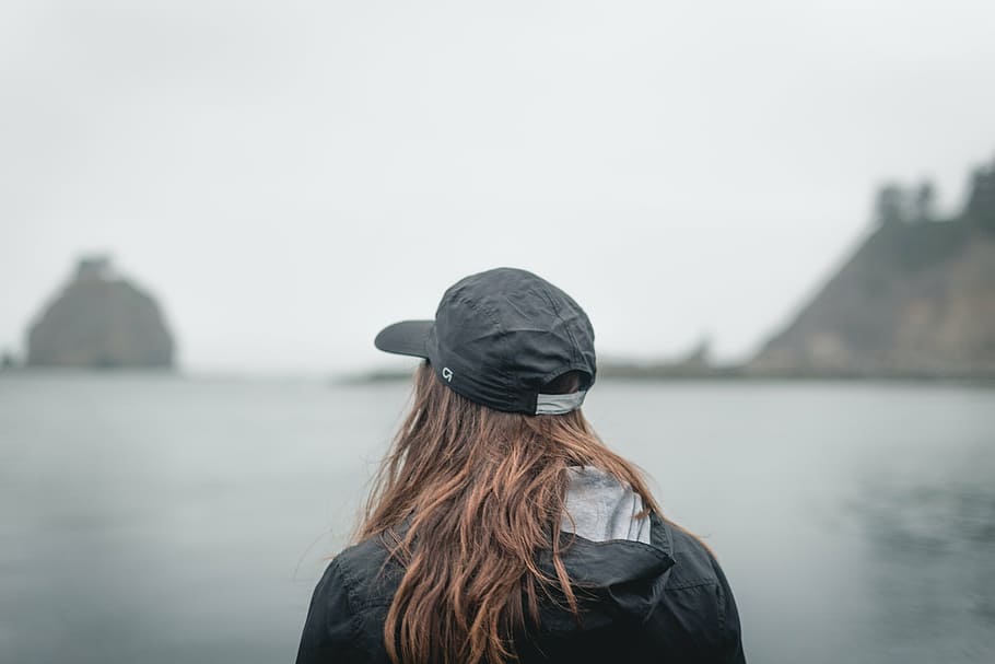 person, facing, body, water, rock isles, black, cap, jacket, front, girl