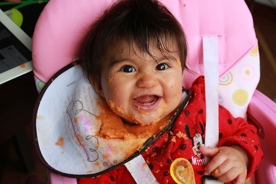 laura isabel, baby, carrot puree, baby smiling, first meal, child, childhood, portrait, smiling, looking at camera